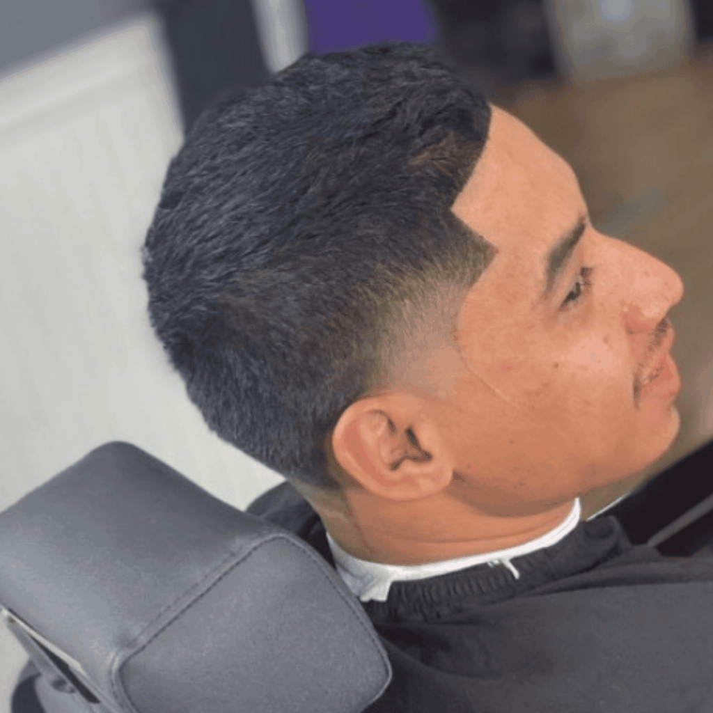 Precision skin fade with sharp lineup for a men's haircut at Cutthroat Barbershop Spokane