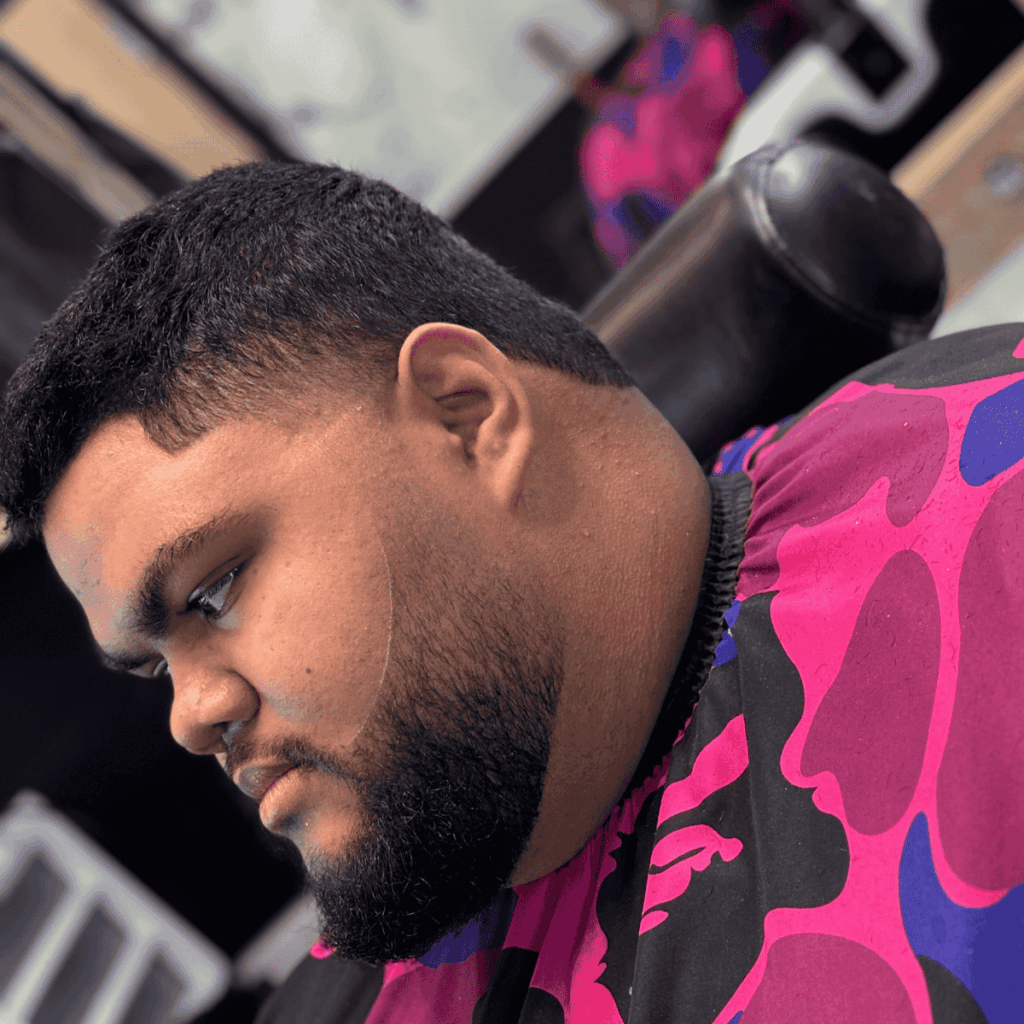 Expertly blended taper fade with beard line up at Cutthroat Spokane