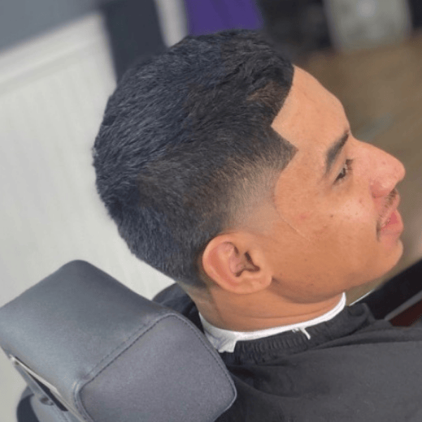 Precision skin fade with sharp lineup for a men's haircut at Cutthroat Barbershop Spokane