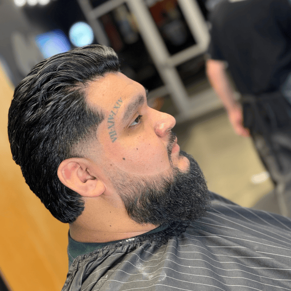Professional beard sculpting and low taper fade for thick hair Spokane