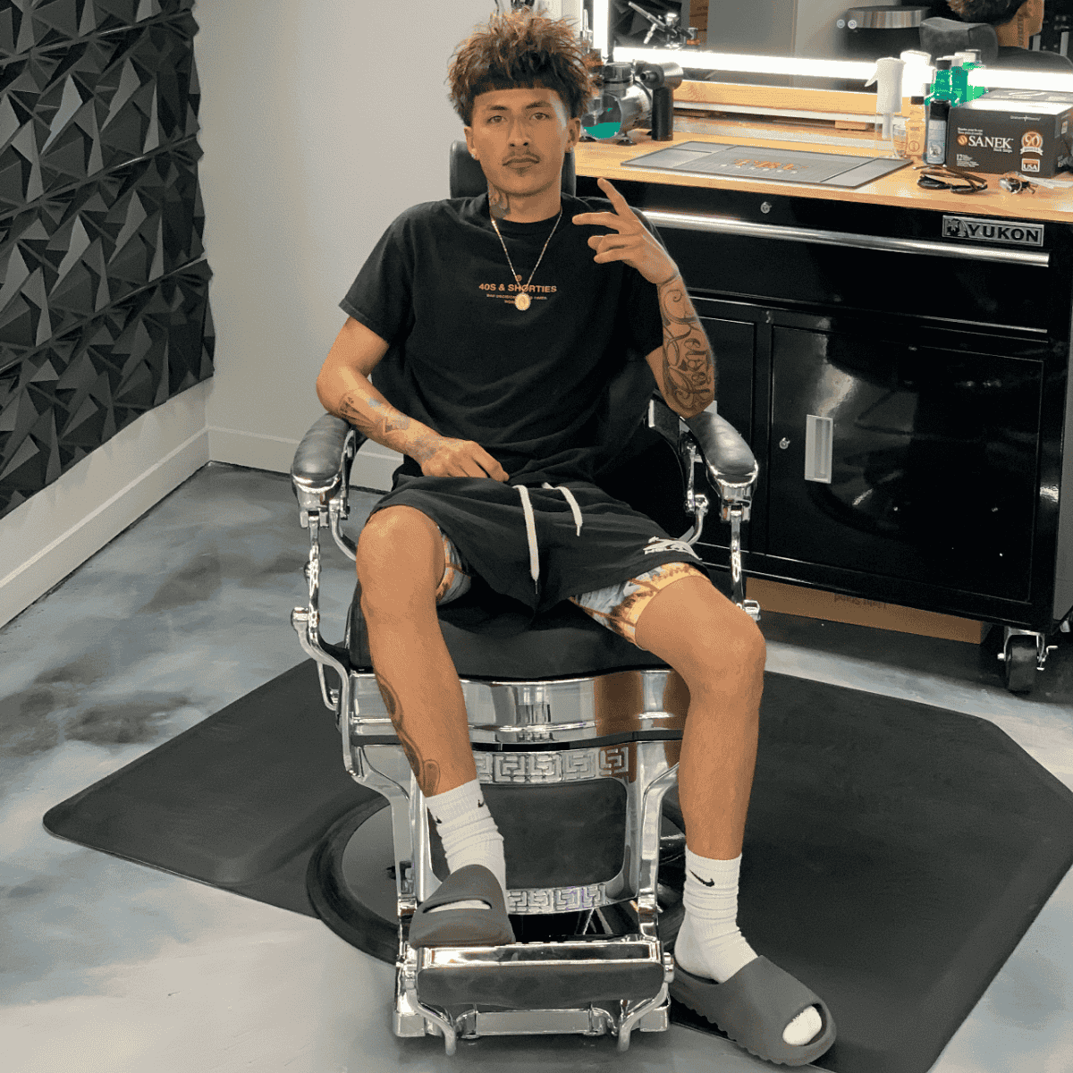 Professional master barber ready for mens haircut appointment in Spokane