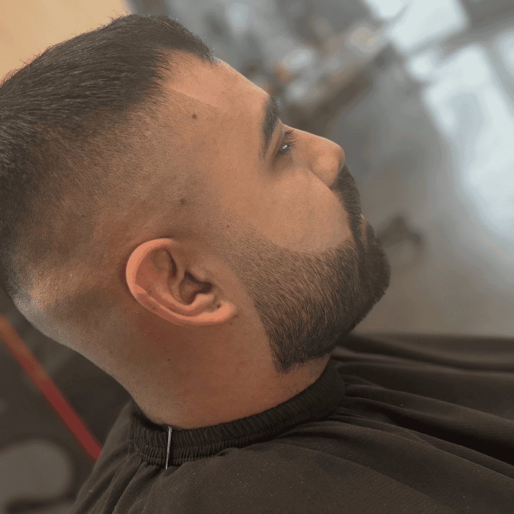 Precision beard grooming and high fade combo at Cutthroat Barbershop