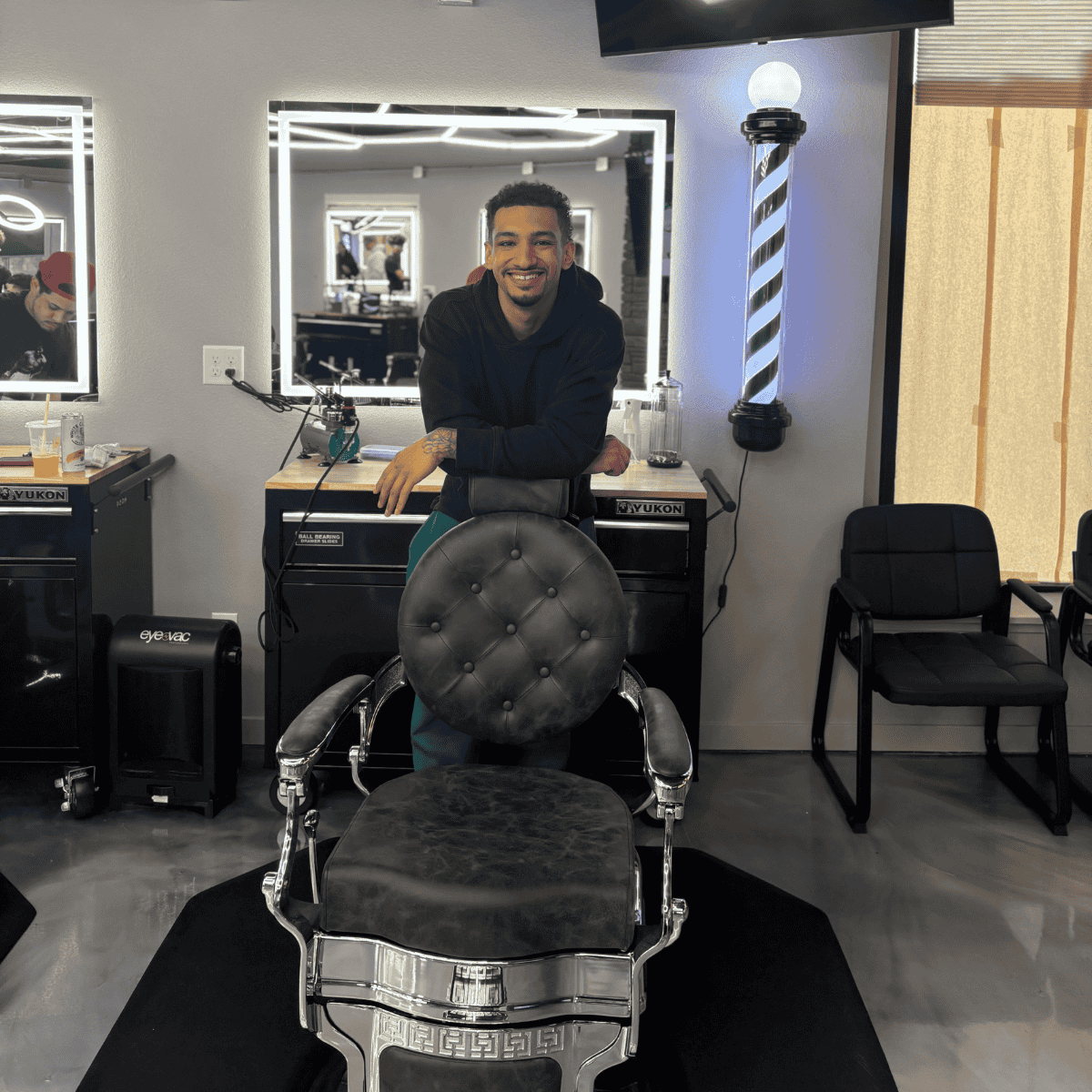 Professional barber at Cutthroat Spokane providing premium mens grooming services