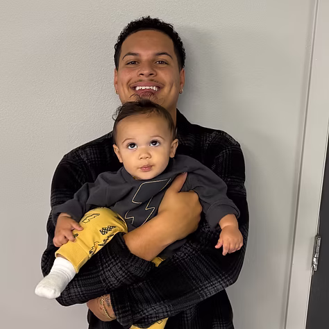 Professional Spokane barber at a modern workstation ready for a haircut appointment