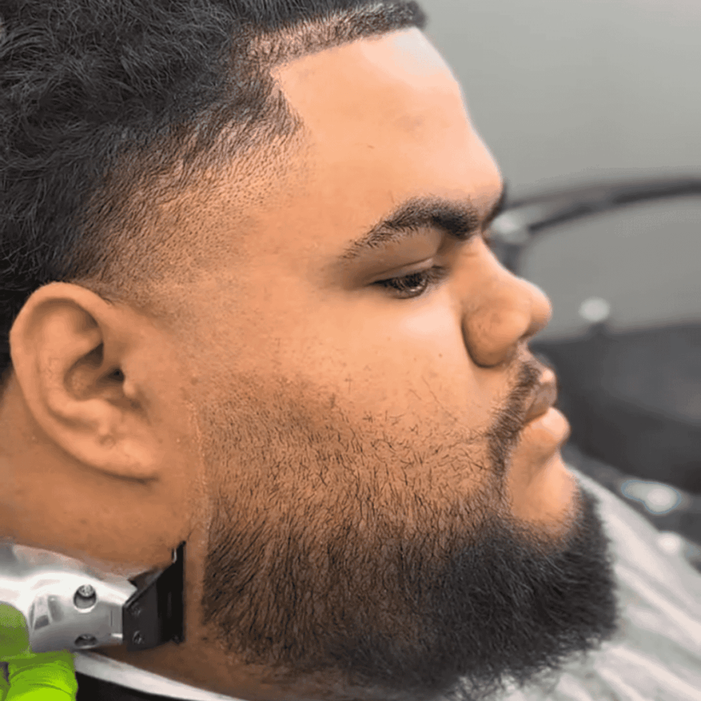 Expert beard shaping and grooming service for men.