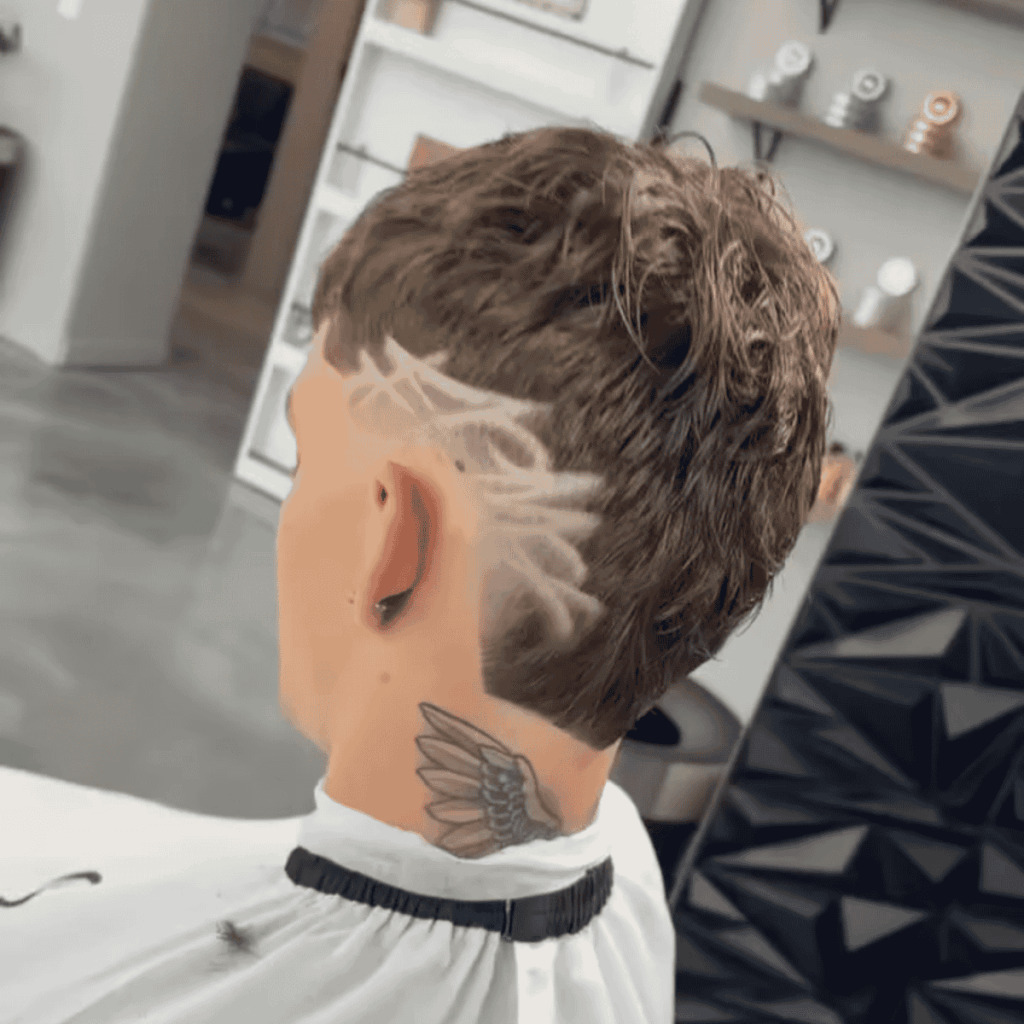 Custom hair art and creative designs shaved into a fresh fade.