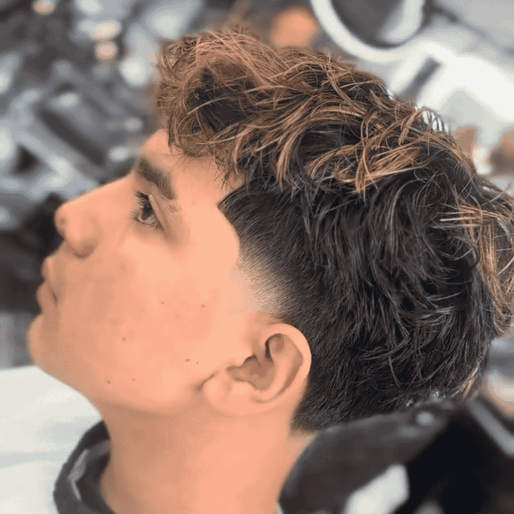Precision hair etching and artistic detailing for modern men's hairstyles.